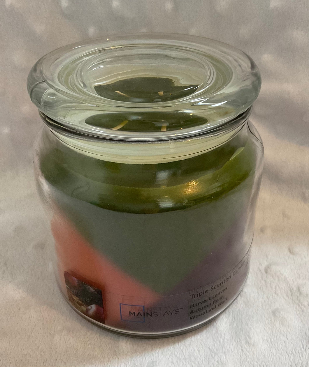 Triple scented jar candle green, orange and deep red colours